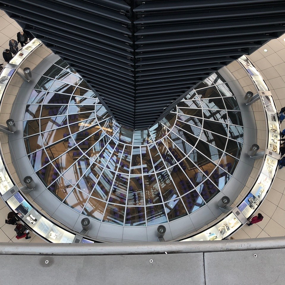 Inside the Reichstag dome, looking down into the German Parliament chamber